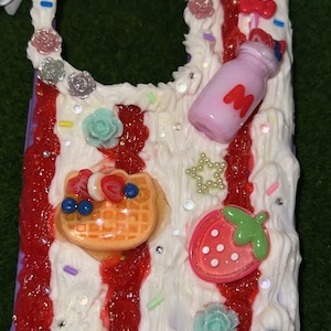 May include: A set of three ceramic nesting bowls in graduating sizes. The bowls are white with a speckled, textured finish and a slightly flared rim. The largest bowl measures approximately 8 inches in diameter.