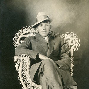 Handsome Stylish Young Man Sitting in ELABORATE WICKER CHAIR - Photo Postcard circa 1910s