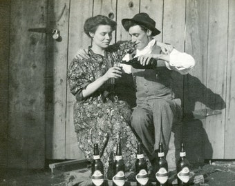 Man and Woman DRINKING a FEW BEERS Sitting Next To the Barn in 1910s Original Photo