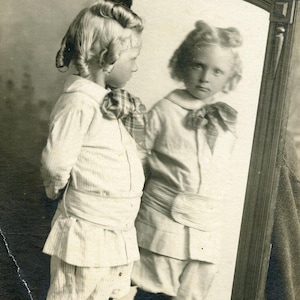 Little Girl with CURLS in HAIR Looking at Reflection in MIRROR in 1910s Original Photo Postcard