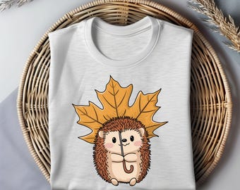 Riccio carino autunnale PNG, clipart di ombrello con foglie autunnali, sublimazione di animali del bosco, arte di creature della foresta, design autunnale accogliente, download digitale