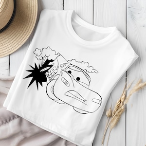 May include: A white t-shirt featuring a black and white outline of a cartoon race car with smoke coming from the exhaust. The car has the number 95 on the side.