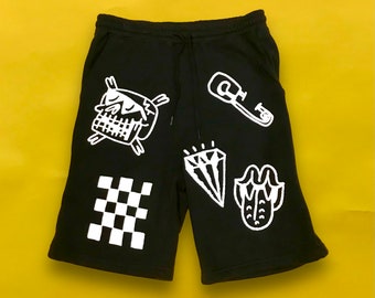 Fleece shorts with all over doodle print