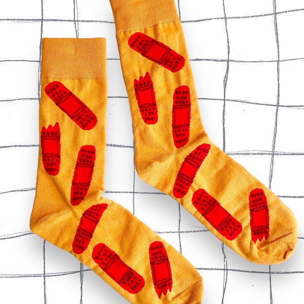 Band aid socks. rad socks. get your socks on. yellow socks. street wear. unisex fashion. dope socks.