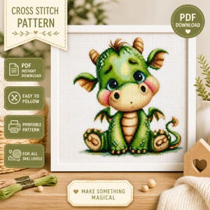 May include: Cross stitch pattern featuring a cute green dragon with large blue eyes, sitting on a white background. The image includes text that says "Cross Stitch Pattern", "PDF Instant Download", "Easy to Follow", "Printable Pattern", and "For All Skill Levels".