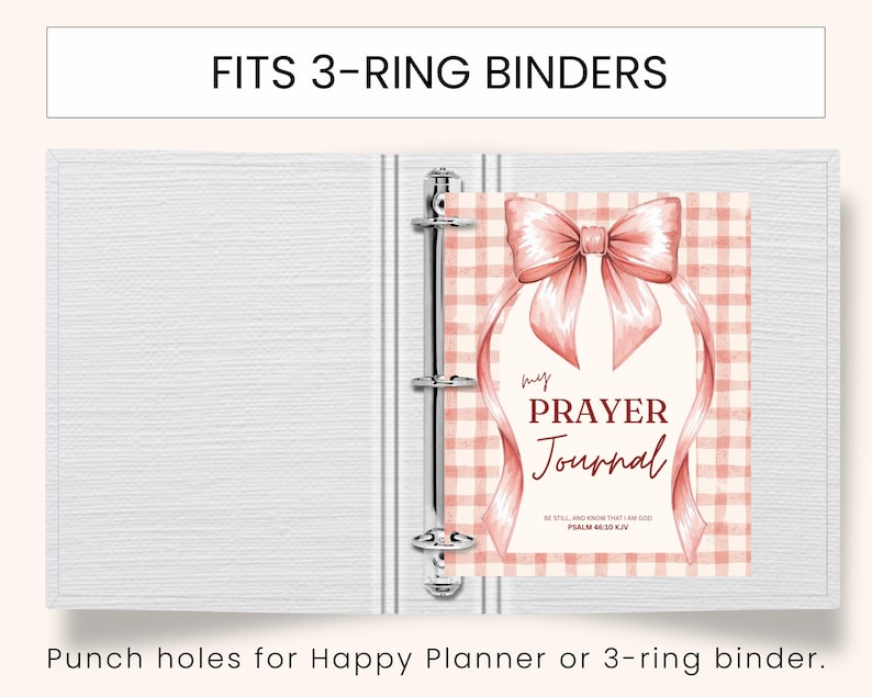 May include: A white 3-ring binder with a pink and white plaid journal insert. The journal cover features a pink bow and the words "my PRAYER Journal". Text at the top reads "FITS 3-RING BINDERS".
