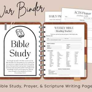 May include: A brown leather-textured binder open to reveal pages titled Bible Study and Weekly Bible Reading Tracker. The pages feature black text, a cross icon, and lists of books of the Bible. Additional loose pages titled Acts Prayer and Daily Prayer are visible.