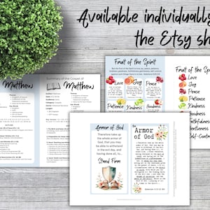 May include: A collection of printed study cards featuring religious themes including the Summary of the Gospel of Matthew, the Fruit of the Spirit with colorful fruit illustrations, and the Armor of God with a shield and sandals graphic.