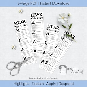 May include: A collection of white Bible study bookmarks with the text "HEAR Bible Study" and instructions. The bookmarks include the words "Highlight," "Explain," "Apply," and "Respond." A pair of silver scissors and white flowers are also in the image.