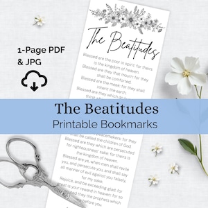May include: A digital download featuring two printable bookmarks with the text "The Beatitudes." The bookmarks are white with black text and floral accents. A pair of decorative scissors and white flowers are also in the image.