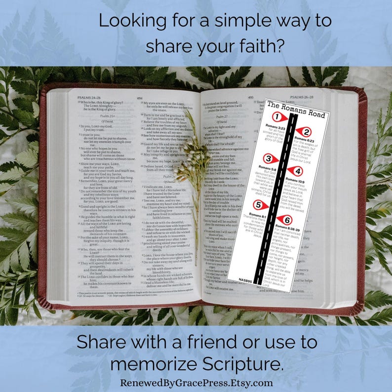 Puede incluir: Una Biblia abierta con un marcador titulado "The Romans Road" se muestra. El marcador resalta vers&iacute;culos clave. La imagen incluye texto: "Looking for a simple way to share your faith?" y "Share with a friend or use to memorize Scripture."