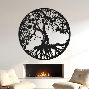 May include: Black metal wall art depicting a tree of life with intricate branches and roots. The tree is set against a white background and is displayed above a fireplace.