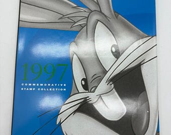 Raccolta annuale di francobolli commemorativi del servizio postale statunitense del 1997, con francobollo incluso.