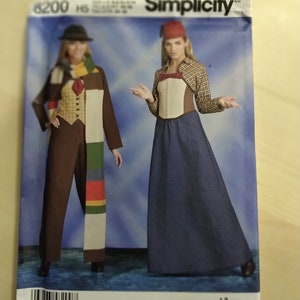 May include: Simplicity sewing pattern number 8200 for a costume. The pattern includes two different outfits: a brown jumpsuit with a vest and a scarf, and a blue skirt with a white corset and a plaid shirt. The pattern is designed and printed in the USA.