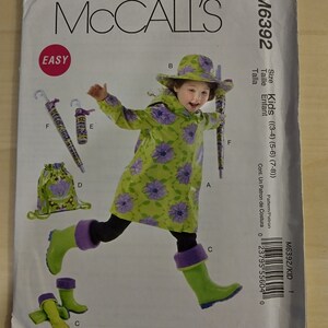 May include: A sewing pattern for a child's raincoat, hat, and boots. The pattern is for sizes 3-4, 5-6, and 7-8. The pattern is called McCall's M6392.