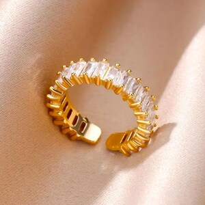 Women's stainless steel rings, gold color, with brilliant