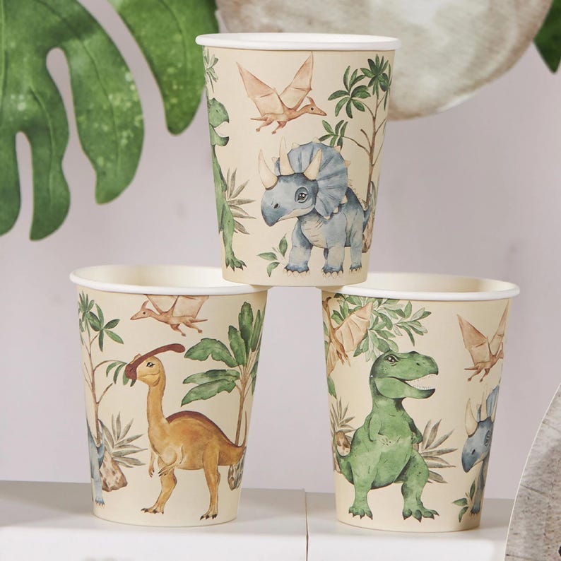 Pyramid stacked cups in styled scene with banner in background