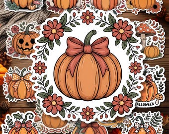 May include: A collection of die-cut stickers featuring orange pumpkins decorated with bows, flowers, and mushrooms. The central sticker displays a large orange pumpkin with a red bow surrounded by a circular wreath of red flowers and green leaves.