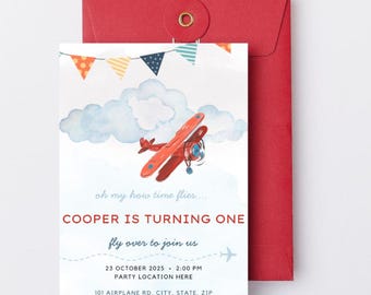 May include: A red airplane flies through a blue sky with white clouds. The invitation reads "oh my how time flies... COOPER IS TURNING ONE fly over to join us 23 OCTOBER 2025 - 2:00 PM PARTY LOCATION HERE 101 AIRPLANE RD, CITY, STATE, ZIP PLEASE RSVP BY OCT. 19"