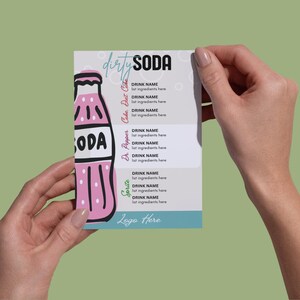 May include: A pink and white Dirty Soda menu card with a soda bottle graphic. The card features drink names and ingredient lists, with the text "dirty SODA" at the top and "Logo Here" at the bottom.
