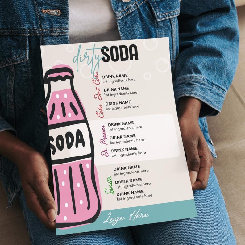 May include: A pink and white "Dirty Soda" menu is held by a person wearing a denim jacket. The menu features a soda bottle graphic and drink name sections for Coke, Diet Coke, Dr. Pepper, and Sprite. The text "Logo Here" is at the bottom.