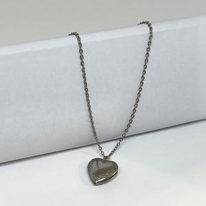 Stainless steel necklace with photo locket.