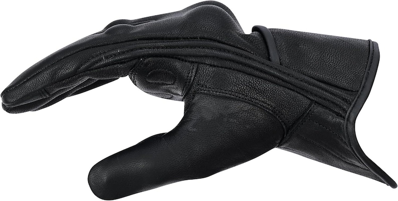 May include: Black leather glove with a curved design. The glove has stitched details and a textured surface. The fingers are slightly curved, suggesting a natural hand position. The overall design is sleek and functional.