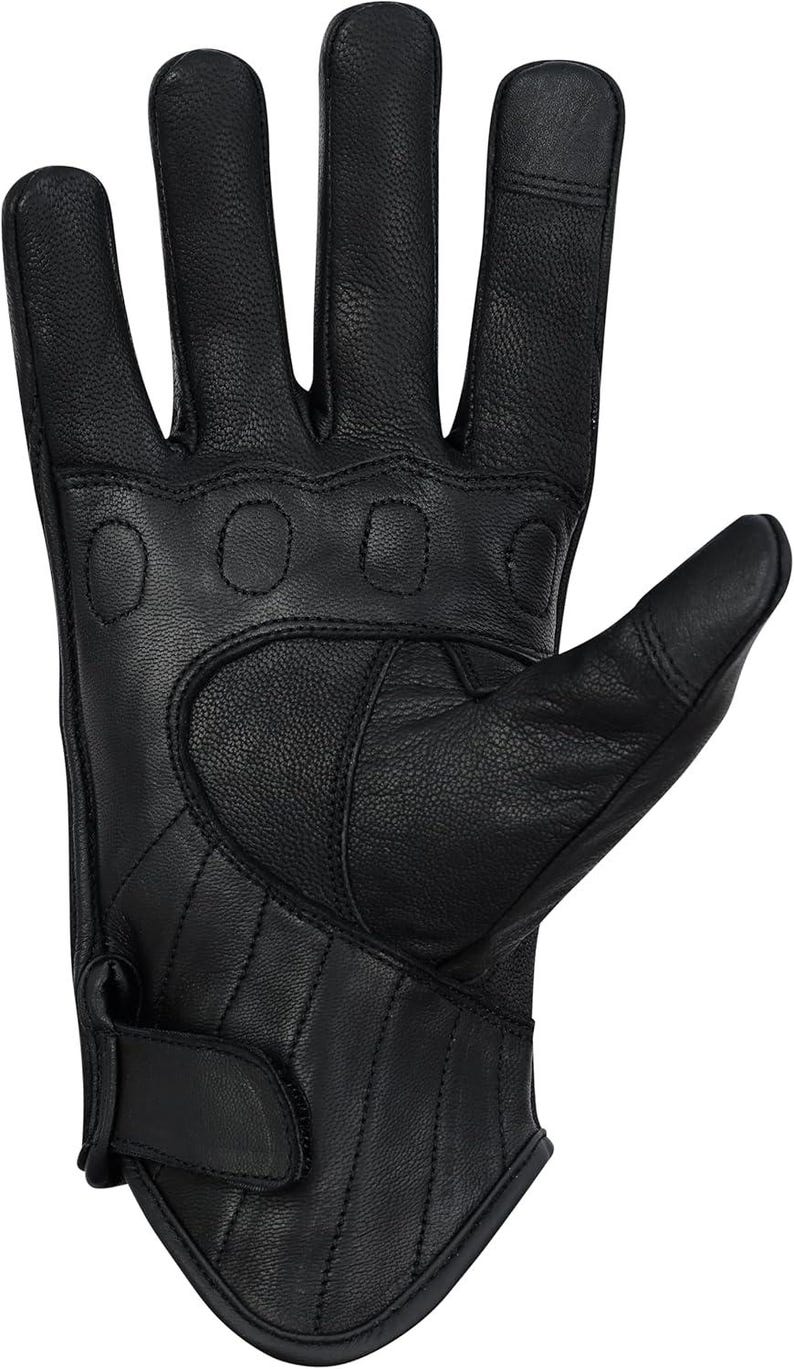 May include: Black leather motorcycle glove with padded knuckles and fingers. The glove features a wrist strap with a snap closure and quilted stitching on the palm. The fingers are pre-curved for a comfortable grip.