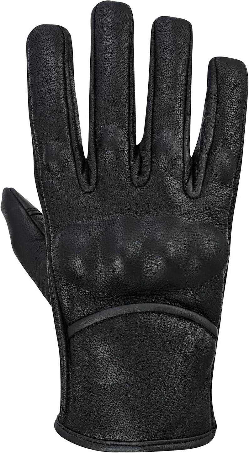 May include: Black leather glove with padded knuckles and a reinforced palm. The glove features a textured surface and a stitched cuff. This protective glove is designed for motorcycle riding or similar activities.