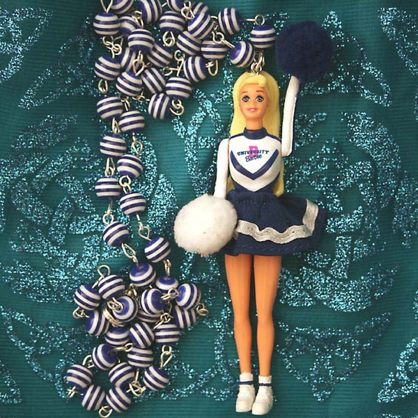 Collier de poupée Barbie pom-pom girl