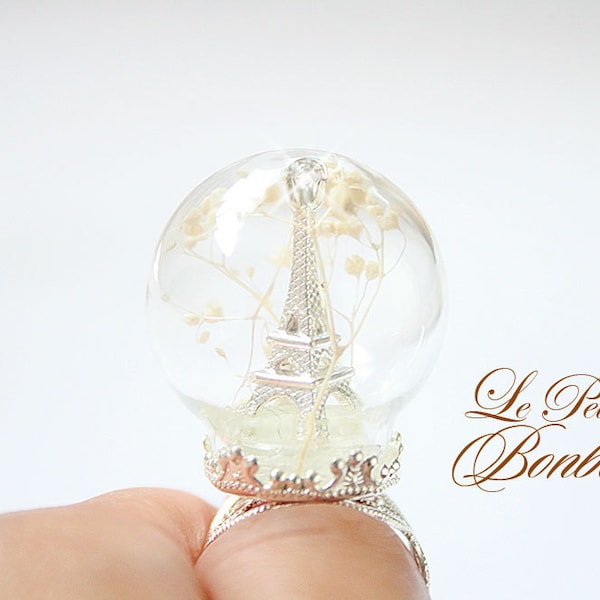 Eiffel Tower in a glass globe winter wonderland edition ring