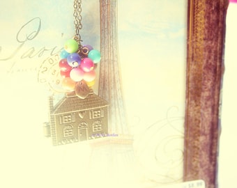 Look, it&#39;s a Flying House from the Up movie with initial necklace