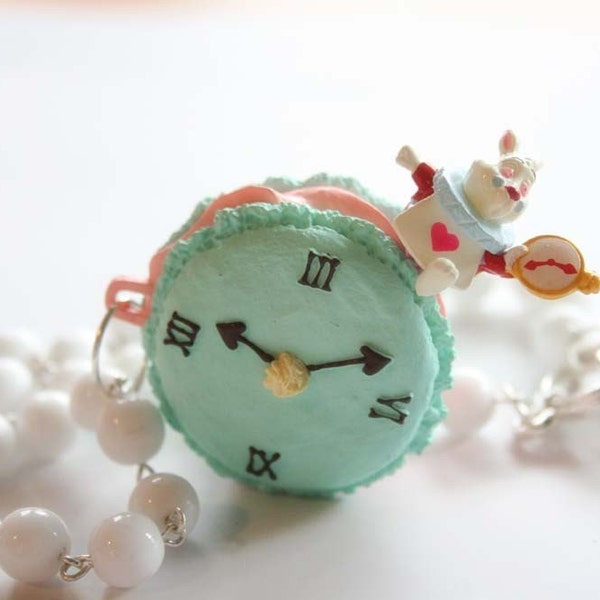 Alice in Wonderland Rabbit sitting on a macaroon necklace