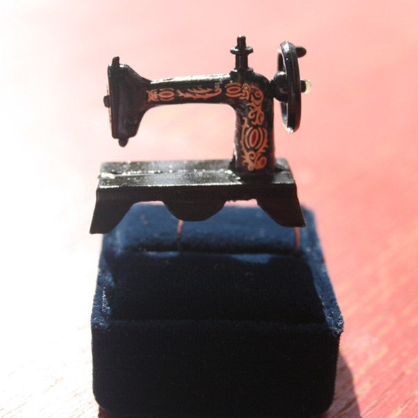 Mad Hatter old fashion Sewing machine ring.