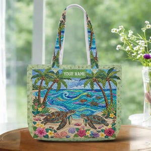 May include: A tote bag featuring a beach scene with palm trees, ocean waves, and sea turtles. The bag has a green border and handles with a tropical design. The text "YOUR NAME" is displayed on the front.