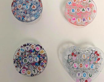 Handgemaakte, aangepaste harstelefoongreep: smartphonehouder met glitterbedel