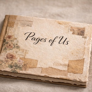 May include: A vintage-style journal with the title "Pages of Us" in elegant script. The cover features a collage of aged paper, floral accents, and postage stamp designs. The book has a textured, aged appearance.