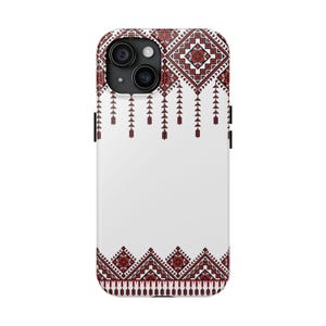 May include: A white smartphone case with a decorative pattern in red and black. The design features geometric shapes and a repeating border pattern. The case has a camera module with three lenses.