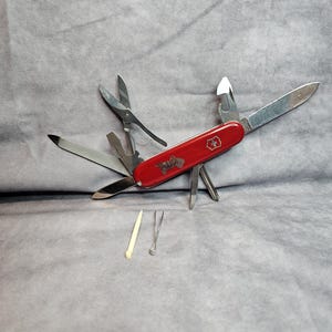 Couteau suisse Victorinox Grand Prix modèle à la retraite 91 mm vintage