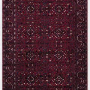 May include: A rectangular, red oriental rug with a detailed geometric pattern. The rug features a central field of repeating diamond and floral motifs in navy and beige, framed by a navy border with a repeating design. The rug has a fringed edge.