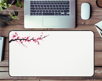 Alfombrilla de escritorio con diseño de flores de cerezo: accesorio minimalista floral para el espacio de trabajo.