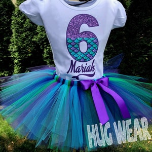 purple and teal outfit