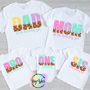May include: Five white t-shirts with ice cream cone designs and text. The shirts say "Dad of the birthday girl", "Mom of the birthday girl", "Bro of the birthday girl", "Sweet One Suvra", and "Sis of the birthday girl".