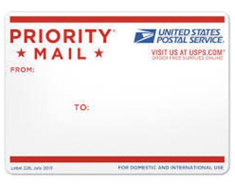 May include: A white Priority Mail shipping label with red borders and text. The label includes the text "PRIORITY MAIL" and "UNITED STATES POSTAL SERVICE". It has spaces for "FROM:" and "TO:" addresses. The label is for domestic and international use.