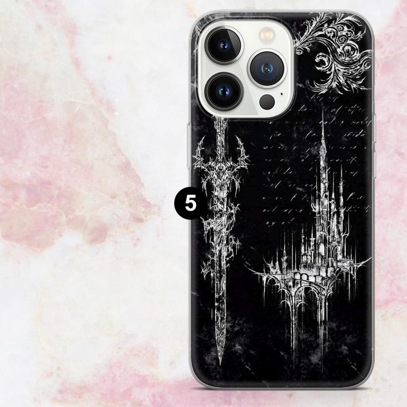 May include: Black phone case featuring a white gothic design. The design includes a sword, a castle, and ornate scrollwork. The case has a glossy finish and a clear border. The number "5" is printed on the case.