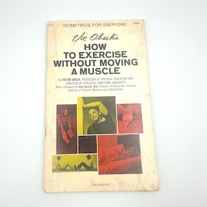 May include: A vintage paperback book titled Vic Obeck's How to Exercise Without Moving a Muscle. The off-white cover features black text, a list of contributors, and five small rectangular photographs showing various isometric exercise poses.
