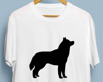 May include: White t-shirt with a black silhouette of a husky dog.