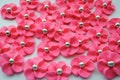 Hot Pink Royal Icing Sugar Flowers With Sparkles and a Silver Dragee Center (24)
