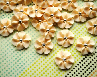 Royal Icing Flowers in Ivory- 3/4 inch flowers with sparkles and a silver dragee center (30)