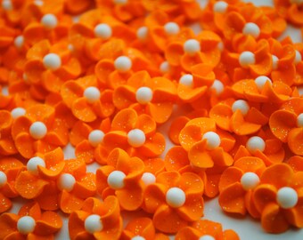 Cake decorations- Non-perishable- 50 Handmade Orange Sparkling Royal Icing Flowers w/ White Matte Sugar Pearls Center